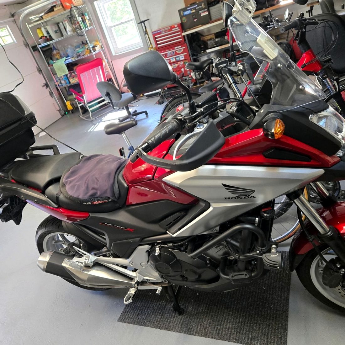 A Honda motorcycle parked in the service bay at Blackwood Cycles, Walden NY.